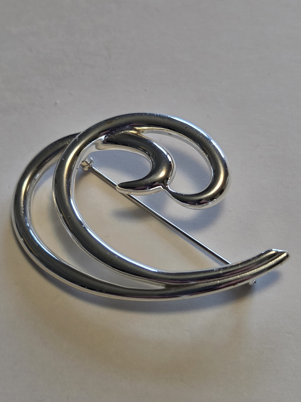 Vtg Crown Trifari Glossy Silver-Tone Modernist Wave Brooch